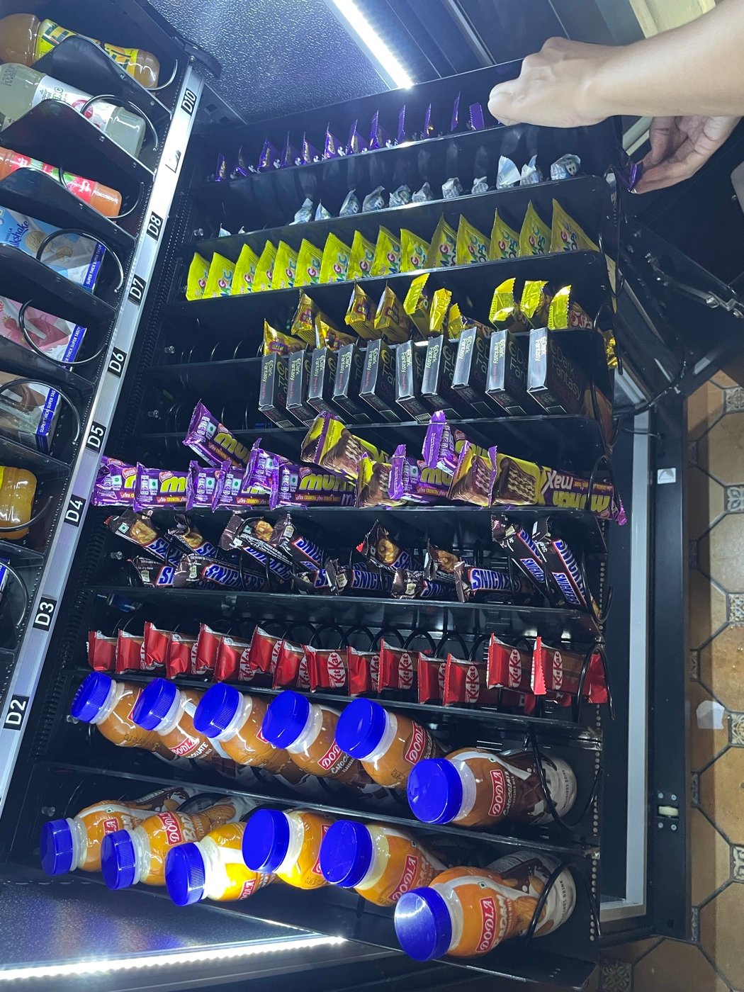 Chocolate bars stocked in a Mystik Box vending machine