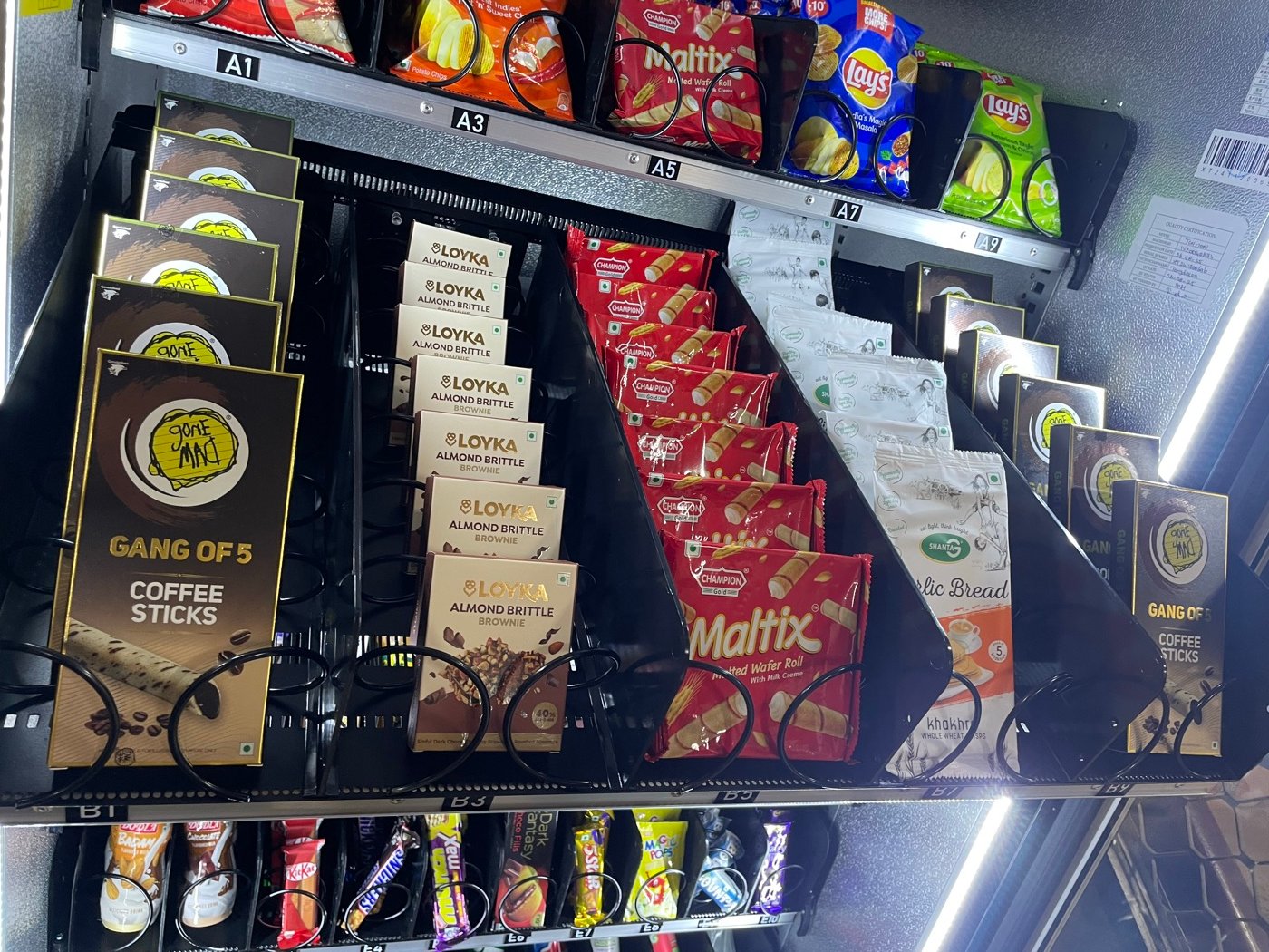 Fully stocked snack trays inside a Mystik Box machine